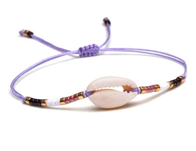 Pulsera Conchas Cauri Cordón Malva