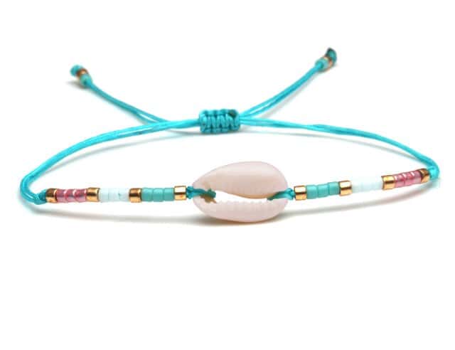 Pulsera Conchas Cauri Cordón Turquesa